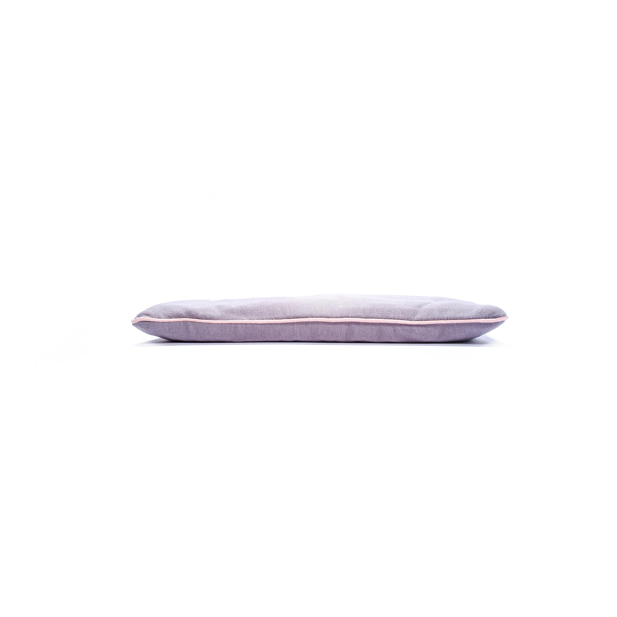 Purple orthopedic pillow with white background for sleep comfort