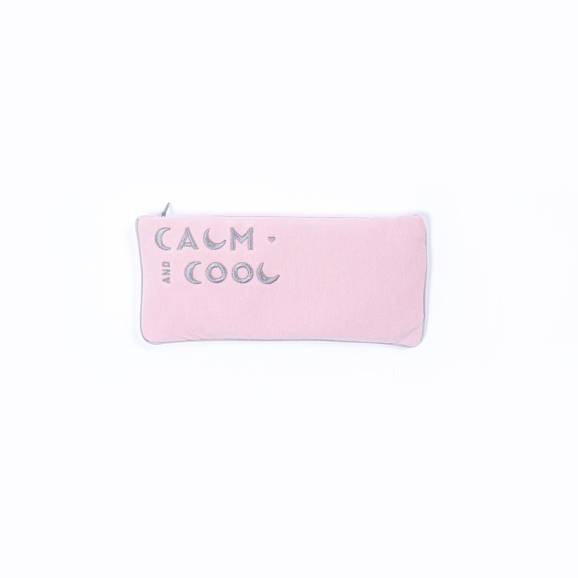 Pink pencil case with calm and cool inscription on white background