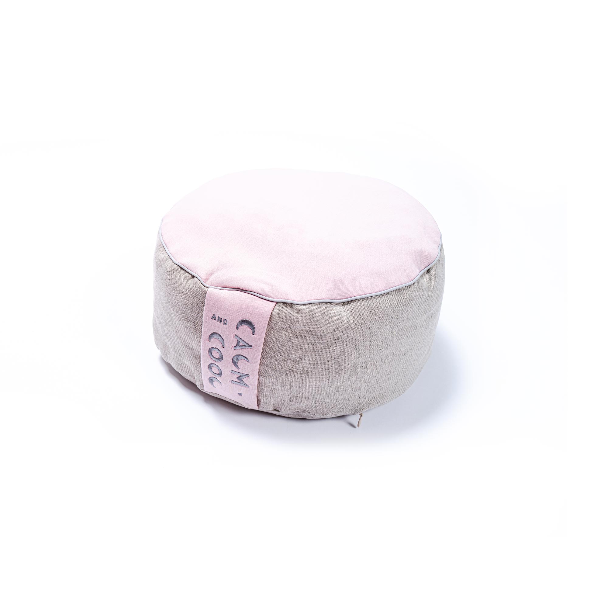 Round gray and pink meditation cushion for relaxation comfort