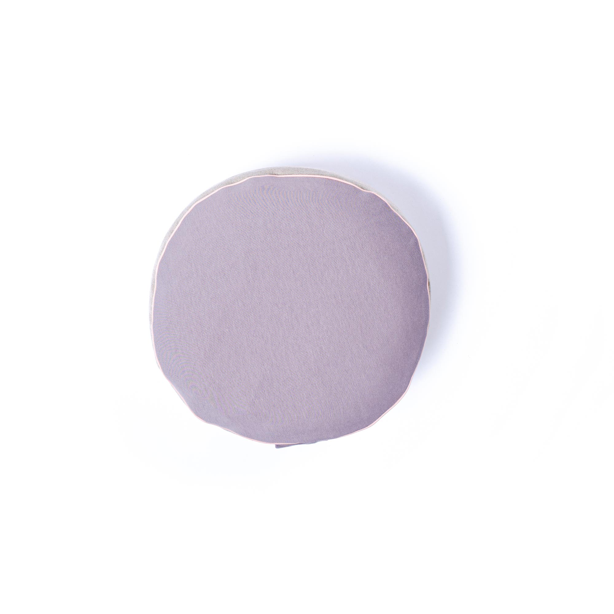 Round lavender cushion on white background for home decor.