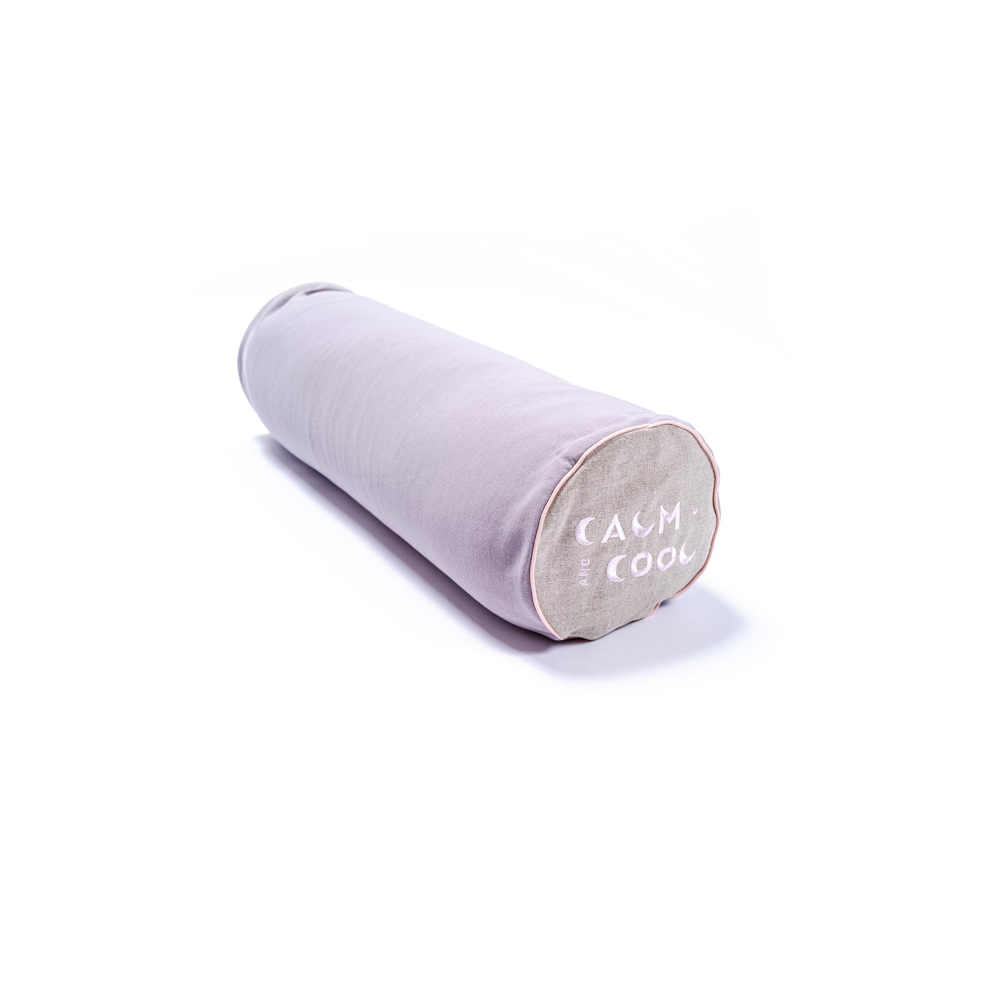 Gray cylindrical yoga bolster with calming text design.
