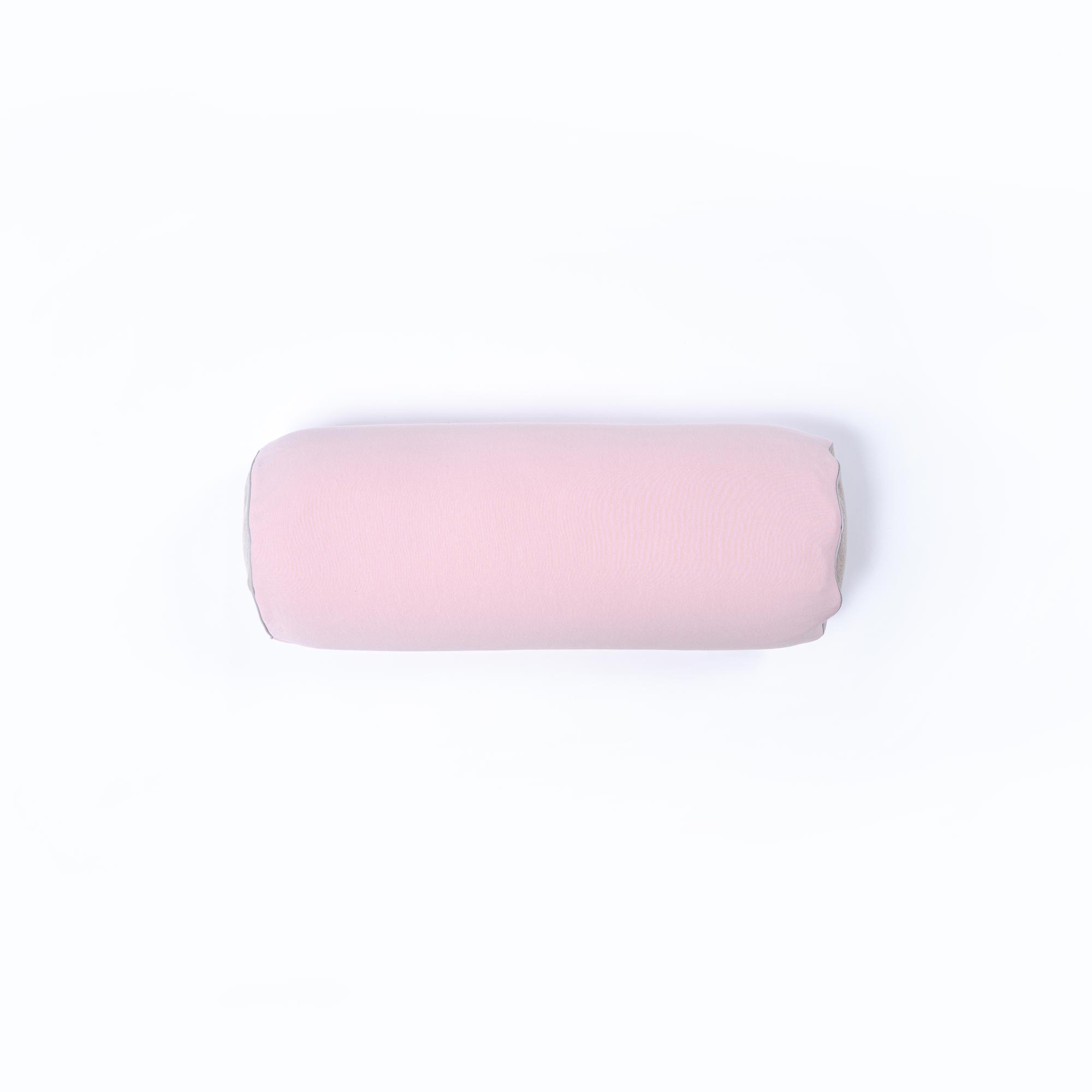 Soft pink cylindrical neck pillow on white background
