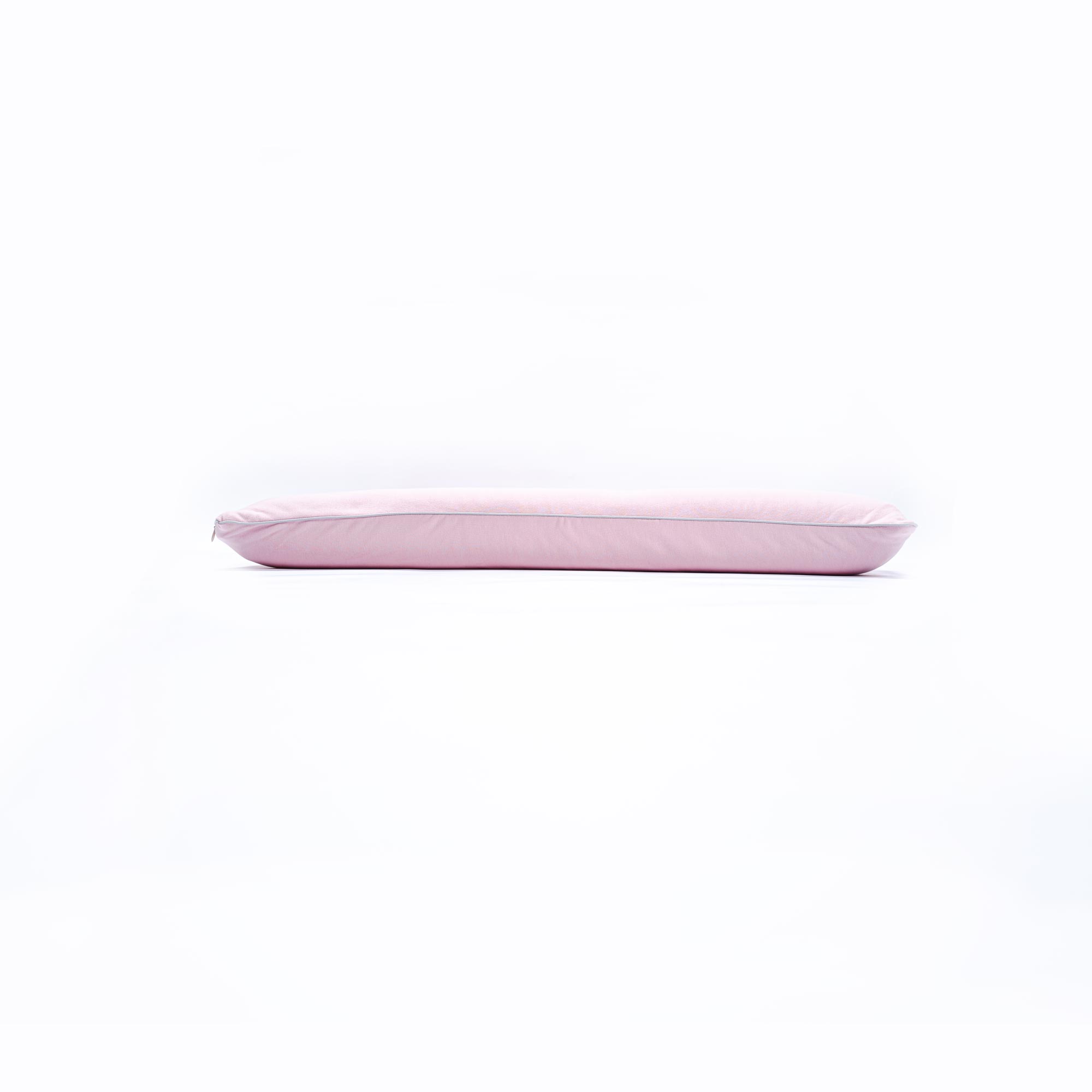 Pink rectangular cushion with minimalist design on white background