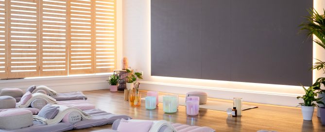 Meditation room with cushions and warm ambient lighting