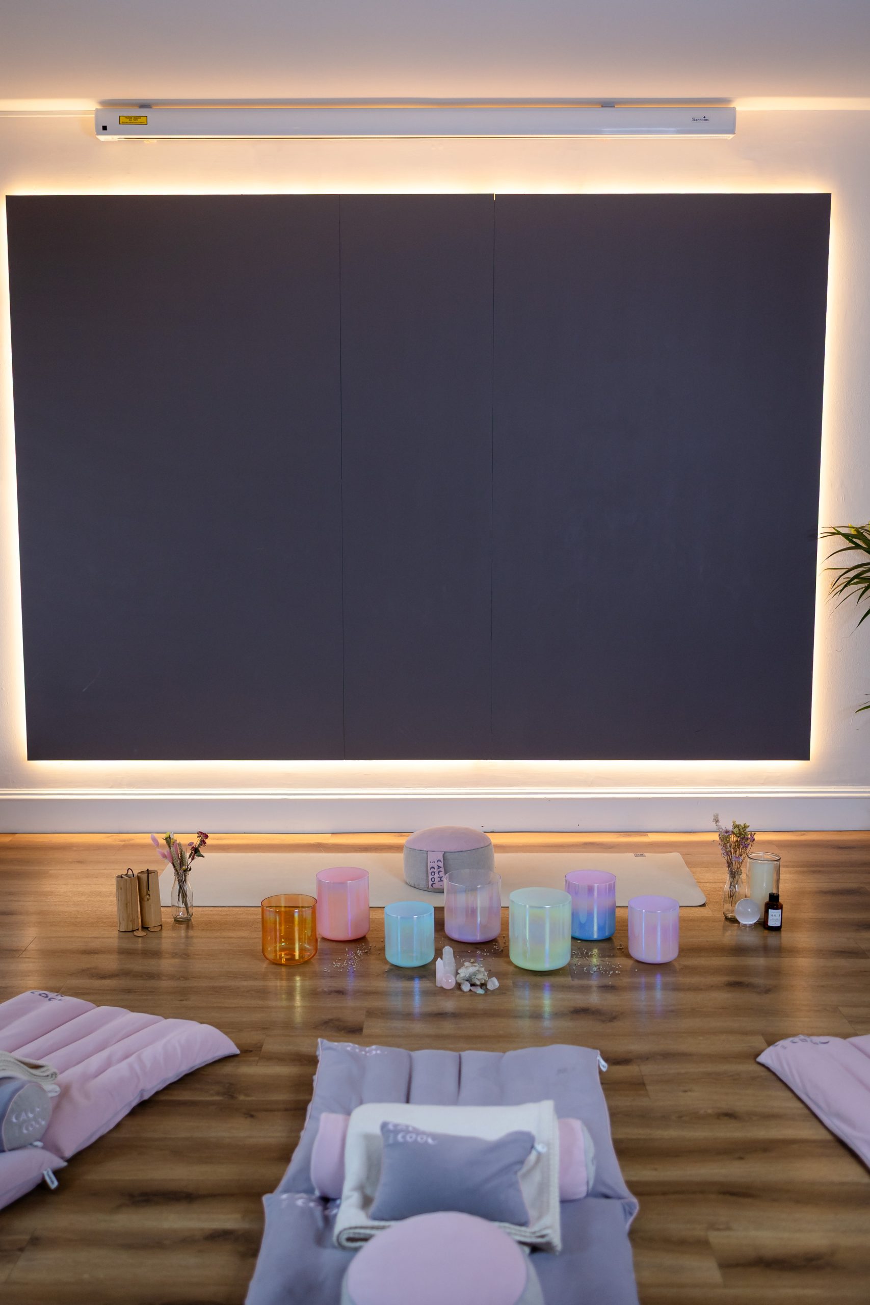 Meditation room with cushions and illuminated decor items