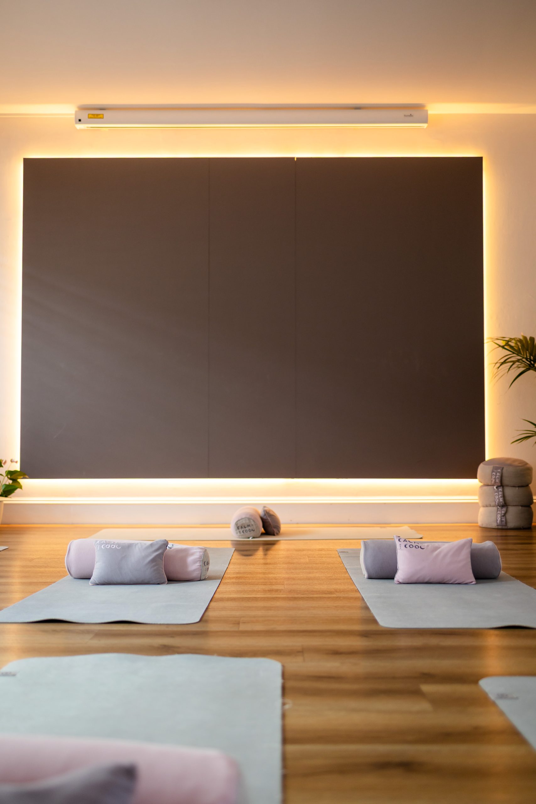 Yoga studio with mats and cushions for meditation practice